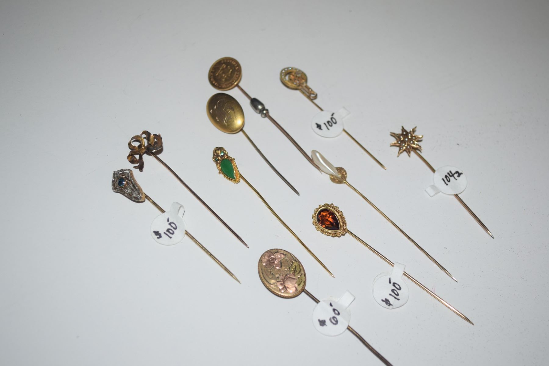 COLLECTION OF STICK PINS (10 PCS) - McClain Auctions Hawaii