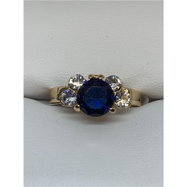 1.0 Carat Blue topaz style gemstone ring set in 14K GP - Size 9