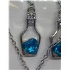 Image 2 : Blue topaz heart in bottle earrings and necklace set