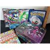 Image 5 : Pokemon handbook, unchecked cards, trading card tin and large cards.
