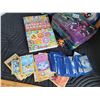 Image 6 : Pokemon handbook, unchecked cards, trading card tin and large cards.