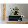 Image 1 : Lucas film Yoda alarm clock.  Battery operated and at alarm says “May the force be with you”