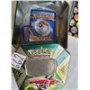 Image 5 : Pokemon collector book, trading card tin, and unchecked cards.