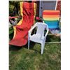 Image 1 : Outdoor patio chairs. Reclining canvas umbrella folding lounger, child's resin chair & vintage canva