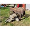 Image 2 : Wooden wagon garden planter with a cow skull and bone.