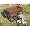 Image 3 : Wooden wagon garden planter with a cow skull and bone.