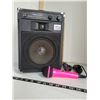 Image 1 : Realistic portable, amplified speaker with a Pink microphone. Works great.