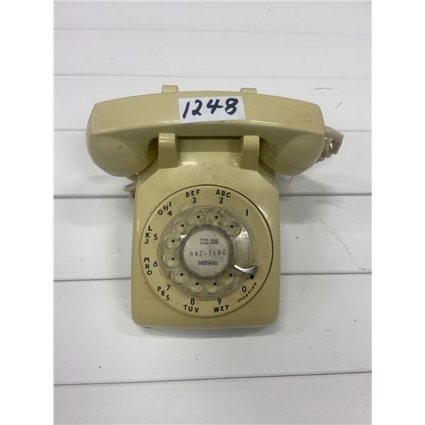 Desk top rotary telephone