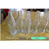 Image 2 : (2X THE MONEY) 8 Clear Coca Cola Bottles Stamped Different Years