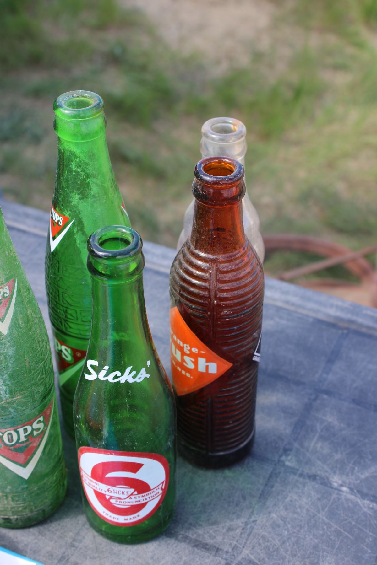 7 Vintage Pop Bottles Bodnarus Auctioneering