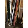 Image 2 : Lot of 4 Pairs of Skis with Rack of Ski Pol 4 Pairs of Poles