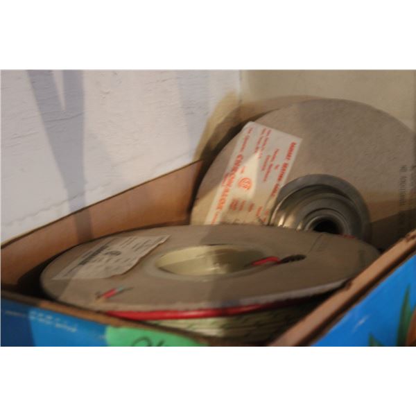 Radiant Heating Cable. The labels on the 3 spools show the length.