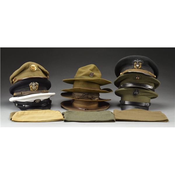 LARGE LOT OF WWI TO VIETNAM ERA MILITARY HEADGEAR.