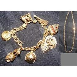 14KT GOLD CHARM BRACELET AND NECKLACE #1884883