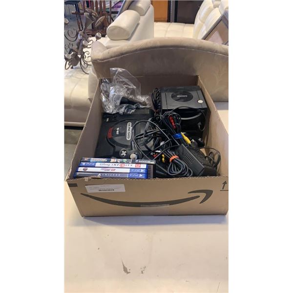 Box of nintendo gamecube, sega genesis consoles, controllers and more