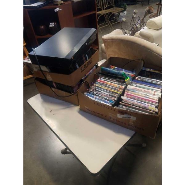 3 BOXES OF DVDS AND DVD PLAYER