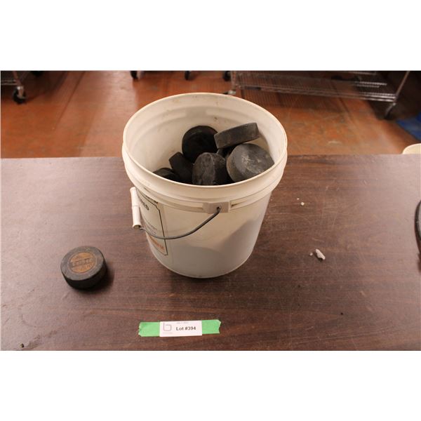 Pail of Hockey Pucks