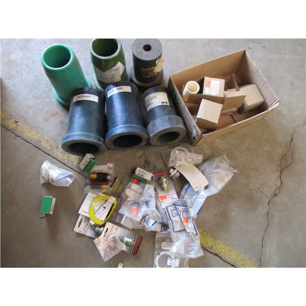 Six Rubber Pipe Sleeves and box of misc fittings