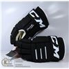 Image 1 : CCM TACKS 4 ROLL 2 JUNIOR HOCKEY GLOVES NEW