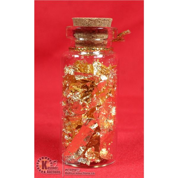 GLASS BOTTLE FILLED WITH GOLD FOIL