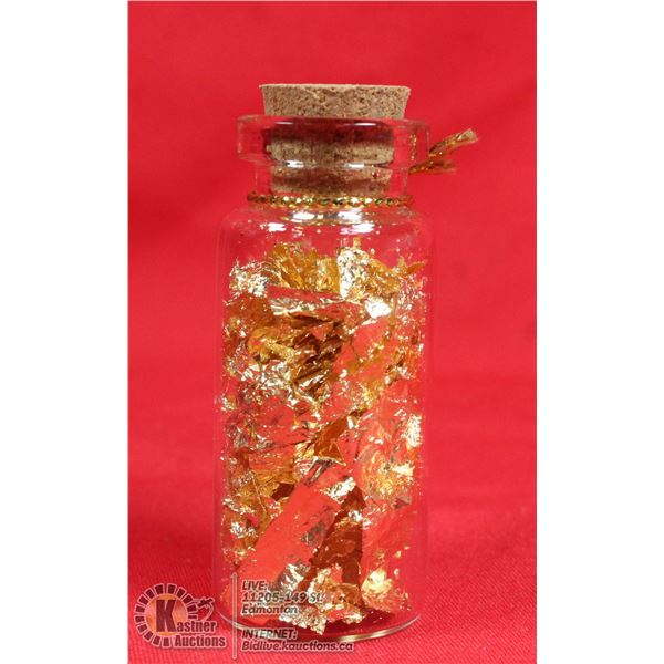 GLASS BOTTLE FILLED WITH GOLD FOIL