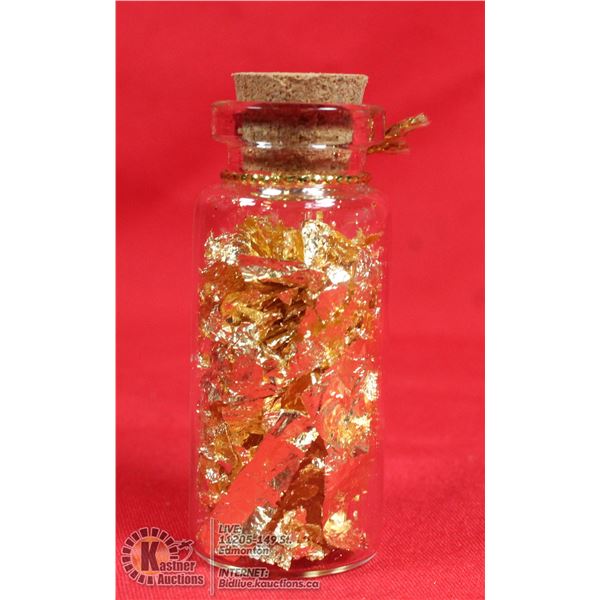 GLASS BOTTLE FILLED WITH GOLD FOIL