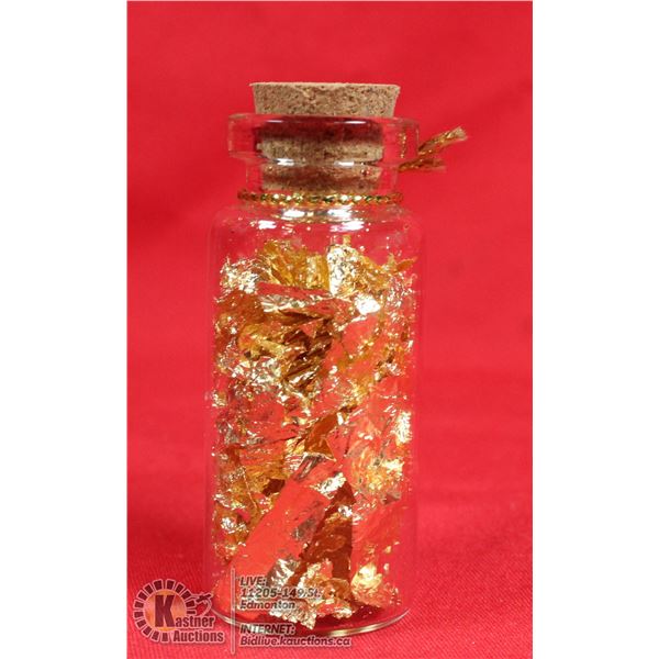 GLASS BOTTLE FILLED WITH GOLD FOIL