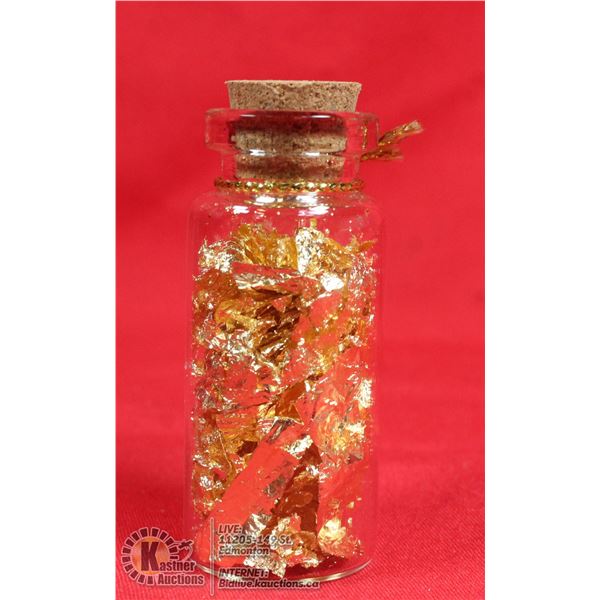 GLASS BOTTLE FILLED WITH GOLD FOIL