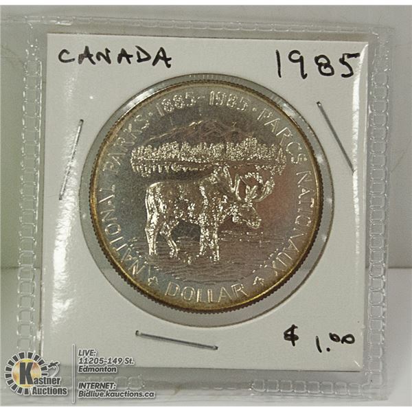 1985 CANADIAN SILVER DOLLAR COIN.