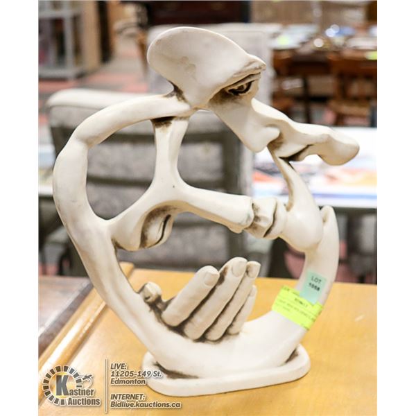 CERAMIC MAN HOLDING LADIES FACE IN HAND -