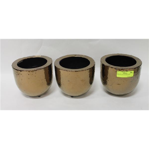 NEW SET OF GOLD COLORED PLANTERS