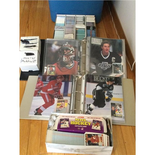 CONTAINER OF SPORTS CARDS INCLUDING 25 BECKETT