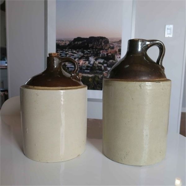 PAIR OF ANTIQUE PRIMITIVE STONEWARE CROCK JUGS