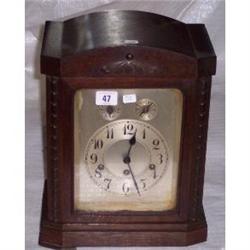 OAK CASED SILVER DIAL CHIMING MANTLE CLOCK