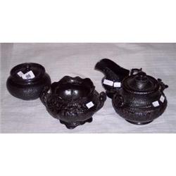 4 PIECES OF BLACK LUSTRE GLAZED POTTERY CO