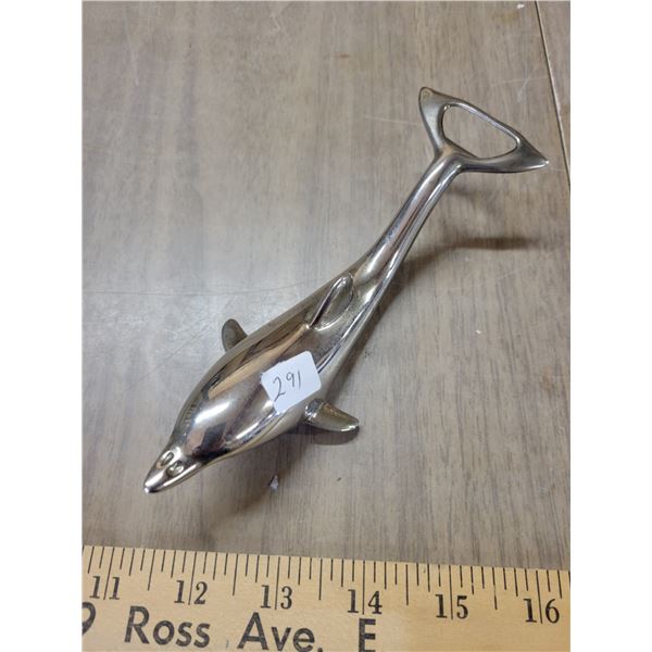 Antique dolphin bottle opener