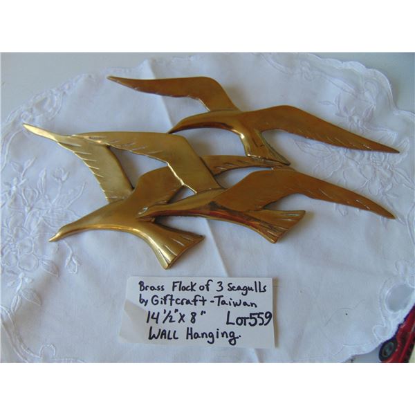 559 14 1/2” BY 8” BRASS FLOCK OF SEAGULLS WALL HANGING