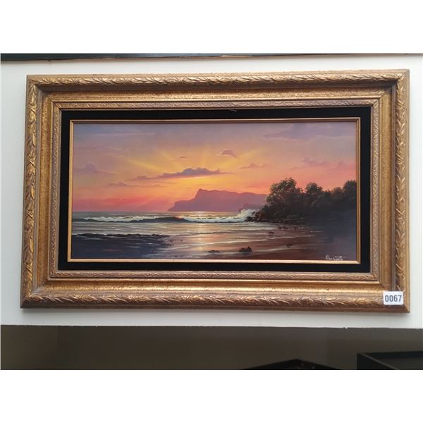 Framed Picture of a Beach at Sunset
