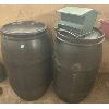 Image 1 : LOT OF 2 POLY BARRELS - 25+ GAL & TIN BIRD FEEDER