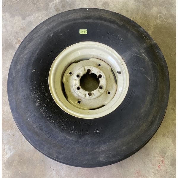 FIRESTONE 11.00-16 IMPLEMENT TIRE - NOTE RIM DAMAGED