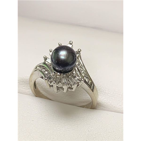 Ladies 14Kt Gold Black Pearl Solitaire 2.37ct with diamonds ring with appraisal certificate value $6
