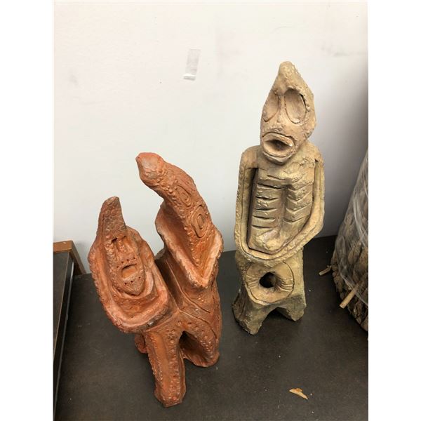 Two clay figurines approx 1 1/2 ft tall from the popular sci-fi tv series