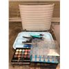 Image 1 : Show prop white fan mounted to egg tray assorted mariposa mascara & box of test tube shot glasses