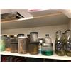 Image 1 : Shelf full of assorted prop jars from the popular sci-fi tv series