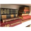 Image 1 : Shelf of assorted hardcover books from the popular sci-fi tv series