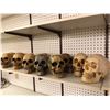 Image 1 : Group of 12 human skull props from the popular sci-fi tv series