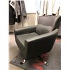 Image 2 : Black leather w/ chrome base swivel accent chair from the popular sci-fi tv series (round white stai
