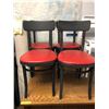 Image 1 : Set of 4 black and red wooden side chairs from the popular sci-fi tv series