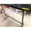 Image 1 : Bar height metal base table w/ black plastic top approx. 5ft across x 3 1/2 high from the popular Sc