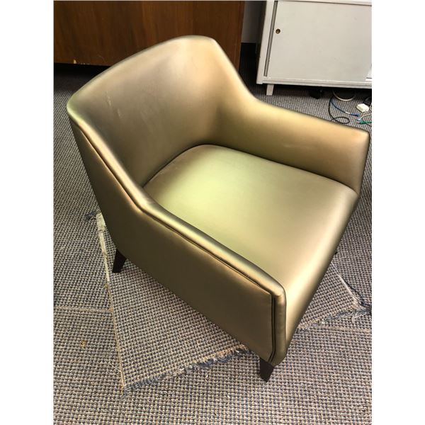 Gold upholstered designer accent chair from the popular Sci-fi series